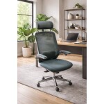 Chaise de bureau ergonomique en tissu gris dans un bureau moderne avec plantes